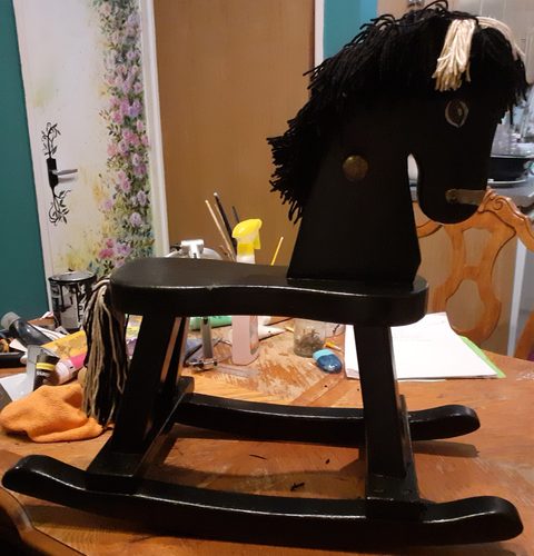 Trish. 30 yr old rocking horse now has new life.